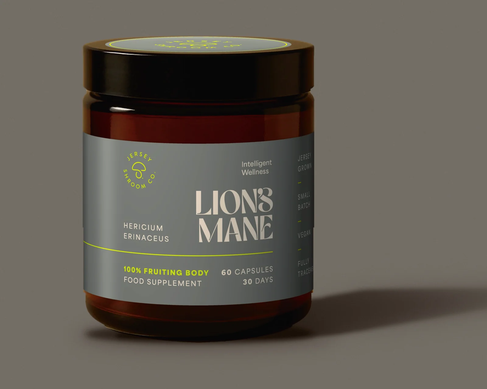 Jersey Shroom Co. Lion's Mane capsules: an amber glass pot with a grey label reading Lion's Mane, 100% fruiting body, food supplement, 60 capsules, 30 days.